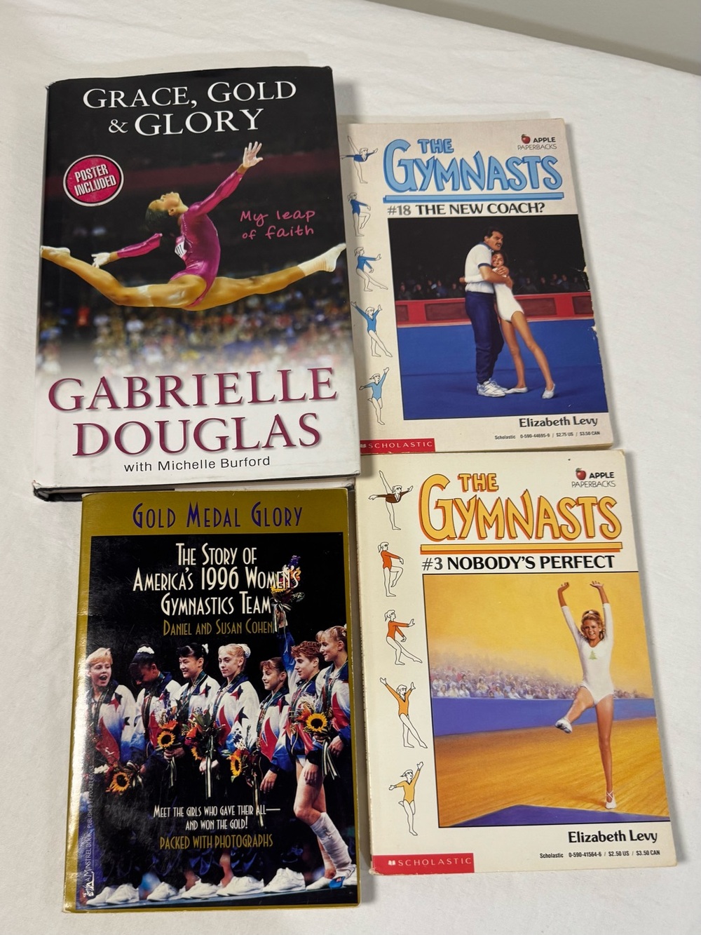 Lot of 4 gymnastics books grace gold glory gabby Douglas